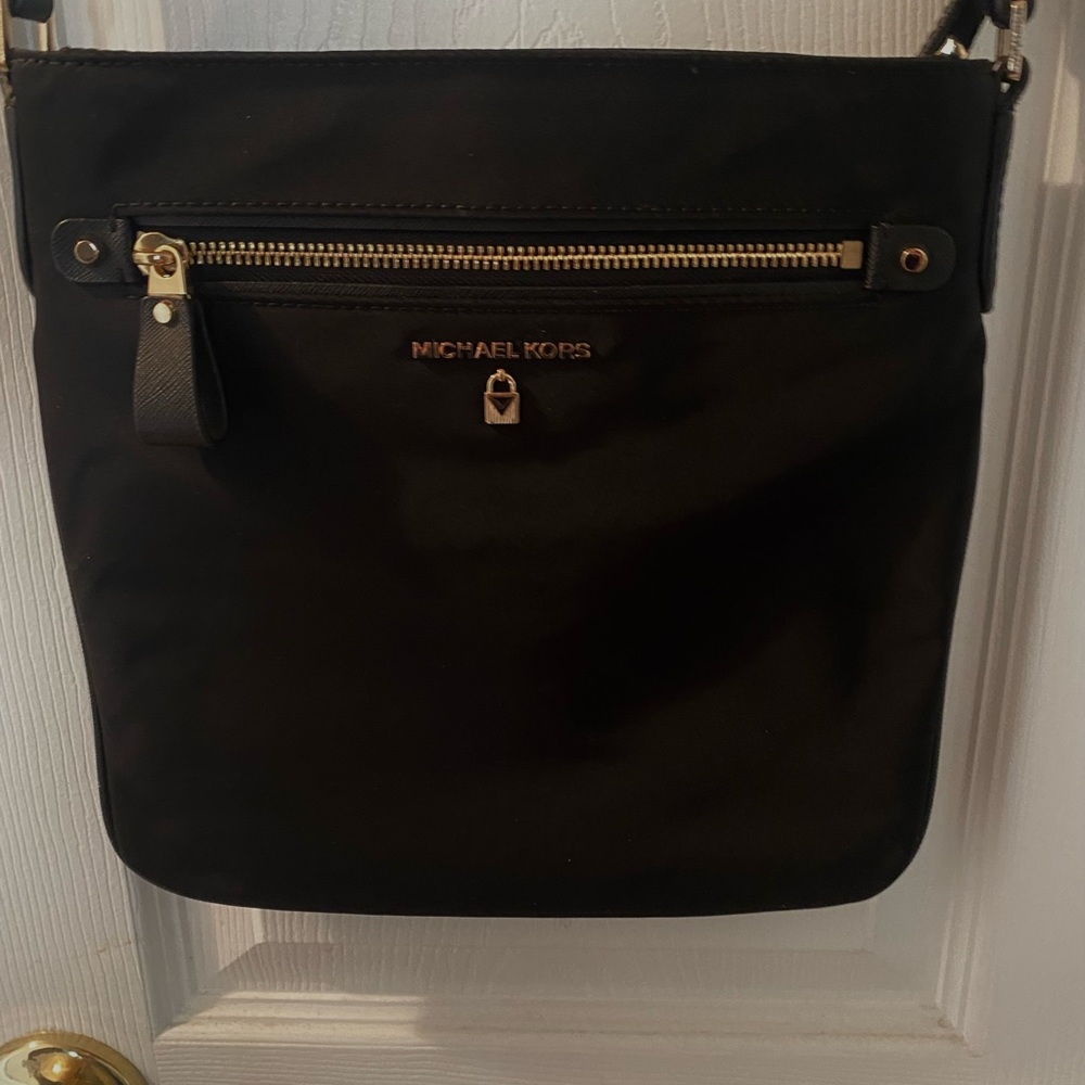 NWOT garabadine with leather handle Michael Kors crossbody.  Paid 128.00